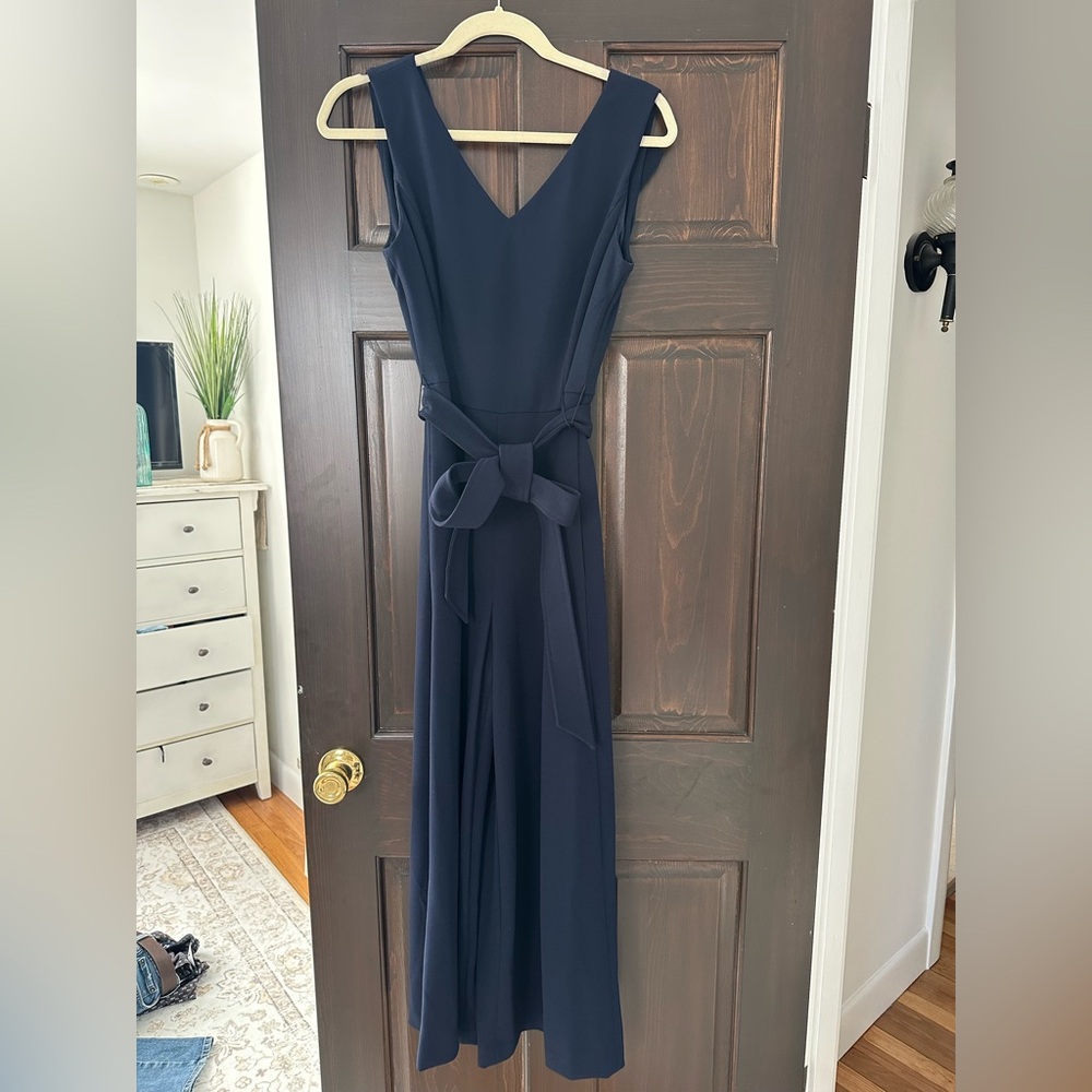 Navy blue sleeveless jumper with detachable belt